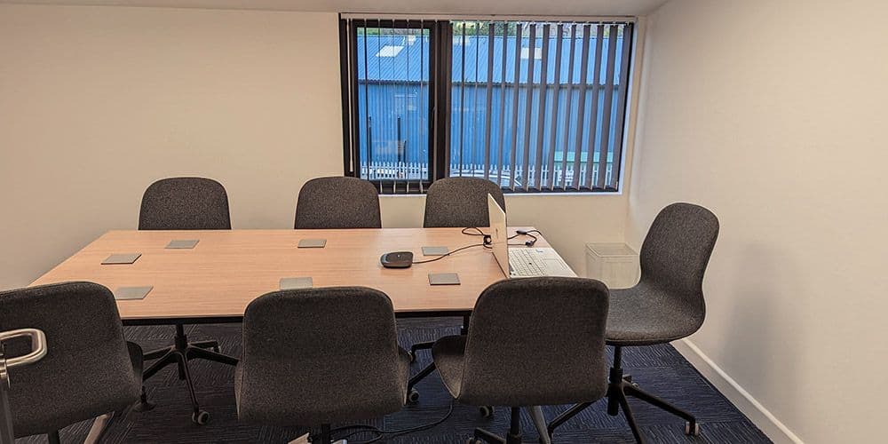 The meeting room at The Kingsbridge Office, set up for eight people